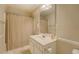 Bathroom with shower and tub combination, vanity, and large mirror at 502 Brookline Pl, Mcdonough, GA 30252
