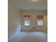 Neutral carpeted bedroom with natural light from the windows at 1453 Cambridge Cmn, Decatur, GA 30033
