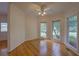 Bright dining area featuring hardwood floors, white trim, and several windows offering natural light at 1453 Cambridge Cmn, Decatur, GA 30033