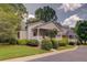 Charming home exterior with a covered front porch and well-maintained landscaping at 1453 Cambridge Cmn, Decatur, GA 30033