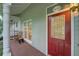 Cozy front porch featuring a seating area and decorative front door with stained glass at 1453 Cambridge Cmn, Decatur, GA 30033