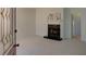 Inviting living room featuring a fireplace, neutral carpet, and plenty of space at 1453 Cambridge Cmn, Decatur, GA 30033