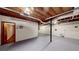 Unfinished basement with concrete floors, exposed beams, and open space, ready to be completed at 203 Cedar Creek Ct, Acworth, GA 30101