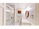 Modern bathroom features a tiled shower with glass doors, and vanity with custom fixtures at 203 Cedar Creek Ct, Acworth, GA 30101
