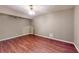 The room is a blank canvas, perfect for personalization with hardwood flooring at 203 Cedar Creek Ct, Acworth, GA 30101