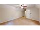 Spacious bedroom with neutral carpeting, ceiling fan, and entry doorway at 203 Cedar Creek Ct, Acworth, GA 30101