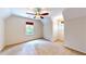 Comfortable bedroom offers a ceiling fan, with natural light creating a tranquil space at 203 Cedar Creek Ct, Acworth, GA 30101