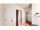 Hallway with multiple doors, tile floor, access to a closet and bathroom at 203 Cedar Creek Ct, Acworth, GA 30101