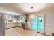 Lovely eat-in kitchen offers lots of counter space and stainless steel appliances at 203 Cedar Creek Ct, Acworth, GA 30101