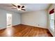Large main bedroom with wood floors, ceiling fan, and natural light at 203 Cedar Creek Ct, Acworth, GA 30101