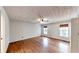 Large main bedroom with wood floors, ceiling fan, and natural light at 203 Cedar Creek Ct, Acworth, GA 30101