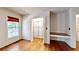 Large main bedroom with wood floors, window, closet, and a built-in desk area at 203 Cedar Creek Ct, Acworth, GA 30101