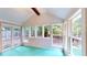 Sunroom with multiple windows and a door to the backyard at 203 Cedar Creek Ct, Acworth, GA 30101