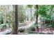 Picturesque view from the house, showcasing a tranquil driveway and surrounding greenery at 203 Cedar Creek Ct, Acworth, GA 30101