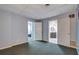 Finished basement space with multiple doorways at 615 Willowbrook Run, Johns Creek, GA 30022