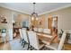 Dining room featuring hardwood floors and neutral color palette at 615 Willowbrook Run, Johns Creek, GA 30022