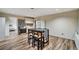 Open floor plan kitchen and dining room with wood floors and modern appliances at 615 Willowbrook Run, Johns Creek, GA 30022