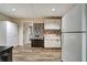 View of the kitchen with stainless steel appliances and tile backsplash at 615 Willowbrook Run, Johns Creek, GA 30022