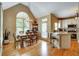 Bright eat-in kitchen with breakfast bar, stainless appliances, and natural light at 615 Willowbrook Run, Johns Creek, GA 30022