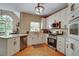 Kitchen with modern appliances, quartz countertops, and hardwood floors at 615 Willowbrook Run, Johns Creek, GA 30022