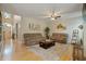Spacious living room featuring hardwood floors, neutral walls, and recessed lighting at 615 Willowbrook Run, Johns Creek, GA 30022