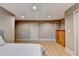 Cozy bedroom with wood floors, fresh paint and storage, creating a serene atmosphere at 8455 Abingdon Ln, Duluth, GA 30097