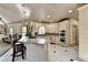 Bright eat-in kitchen with stainless steel appliances, tile floors, granite counters, and a breakfast bar at 8455 Abingdon Ln, Duluth, GA 30097