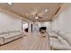 Spacious living room featuring recessed lighting, a ceiling fan, and wood-look floors at 8455 Abingdon Ln, Duluth, GA 30097