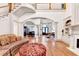 Expansive living room with fireplace, hardwood floors, and open floor plan at 8455 Abingdon Ln, Duluth, GA 30097