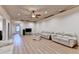 Bright living room with recessed lighting and laminate wood flooring, ideal for relaxation and entertaining at 8455 Abingdon Ln, Duluth, GA 30097