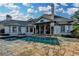 Beautiful pool with stone surround and covered patio, perfect for entertaining or relaxing poolside at 8455 Abingdon Ln, Duluth, GA 30097