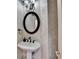 This powder room features decorative wallpaper, a pedestal sink, and stylish lighting at 8455 Abingdon Ln, Duluth, GA 30097