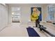 Bright exercise room featuring modern equipment, natural light, and a peaceful ambiance at 1111 Waterford Green Pt, Marietta, GA 30068