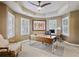 Home office features built-in shutters, trey ceilings, and a large desk at 1111 Waterford Green Pt, Marietta, GA 30068