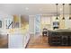 Gourmet kitchen featuring granite countertops, stainless appliances, and hardwood flooring at 1111 Waterford Green Pt, Marietta, GA 30068