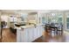 Spacious eat-in kitchen with two islands, stainless appliances, and hardwood floors at 1111 Waterford Green Pt, Marietta, GA 30068