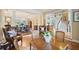 Open-concept living space showcasing hardwood floors, elegant furnishings, and a seamless flow to the dining area at 1111 Waterford Green Pt, Marietta, GA 30068