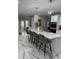 Beautiful open kitchen with an island, modern appliances, and seating for four at 125 Sir Lancelot Ct, Fayetteville, GA 30214