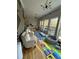 Comfortable sitting room with hardwood floors, a ball pit and playful decor at 125 Sir Lancelot Ct, Fayetteville, GA 30214