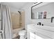 Bathroom with white vanity, dark hardware, and shower/tub combination at 3860 Paint Cir, Douglasville, GA 30135