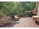 Expansive deck perfect for outdoor entertaining with ample seating and wooded views at 3860 Paint Cir, Douglasville, GA 30135