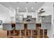 Stylish kitchen with a breakfast bar, pendant lights, and granite countertops at 3860 Paint Cir, Douglasville, GA 30135