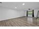 Bright living room features a large window and neutral colors at 3860 Paint Cir, Douglasville, GA 30135