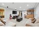 Finished basement with comfortable seating, bar area, and television at 2012 Arbor Springs Way, Buford, GA 30519