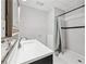 Bathroom featuring a walk-in shower and neutral tile work at 2012 Arbor Springs Way, Buford, GA 30519