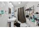 Full bathroom featuring a sink, toilet, and shower at 2012 Arbor Springs Way, Buford, GA 30519