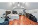 Bonus bedroom featuring hardwood floors, large window, and ample space at 2012 Arbor Springs Way, Buford, GA 30519