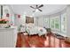 Charming bedroom with hardwood floors, neutral walls, and large windows for natural light at 2012 Arbor Springs Way, Buford, GA 30519