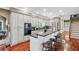 Gourmet kitchen featuring a breakfast bar, stainless steel appliances, and granite countertops at 2012 Arbor Springs Way, Buford, GA 30519