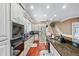 Well-equipped kitchen features granite countertops, modern appliances, and ample storage space at 2012 Arbor Springs Way, Buford, GA 30519